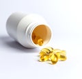 Fish Oil Capsules With A White Pill Bottle