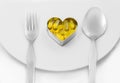 Fish oil heart on dish menu Royalty Free Stock Photo