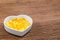 Fish oil in heart shape bowl Royalty Free Stock Photo