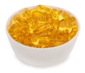 Fish oil, omega 3 in capsules in bowl Royalty Free Stock Photo