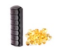 Fish oil pills with pill organiser Royalty Free Stock Photo