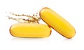 Fish oil softgel capsules on white background. Omega 3 dietary supplement