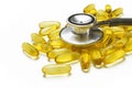 Fish oil and stethoscope Royalty Free Stock Photo