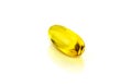 Fish oil supplement capsule isolated on white background Royalty Free Stock Photo