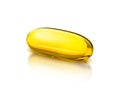 Fish oil supplement capsule isolated on white background Royalty Free Stock Photo