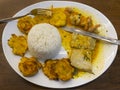 Fish with patacones traditional ecuadorian food Royalty Free Stock Photo