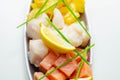 Fish pie mix, defrosted, skinless and boneless cod, dyed smoked haddock and salmon Royalty Free Stock Photo