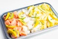 Fish pie mix, raw skinless and boneless cod, dyed smoked haddock and salmon Royalty Free Stock Photo