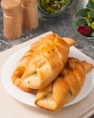 Fish pies on a white plate. Close up