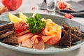 Fish Platter with Light-Salted Salmon, Smoked Salmon, Red Caviar and Borodino Black Bread Toast