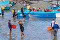 Fish Port of La Libertad. Artisanal fishermen unload boats, Ecuador