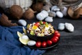 Fish salad with sardines, harringe, tuna, tomato, lemon, lettuce, cabbage, olives, beans, corn, carrotes and eggs