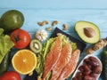 Fish salmon eating dinner health on a blue wooden background different Royalty Free Stock Photo