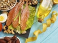 Fish salmon date salad health an vitamin e lemon nourishment centimeter omega 3 avocado on blue wooden background healthy food Royalty Free Stock Photo