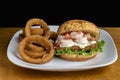 fish sandwich top with tarter sauce and shrimp Royalty Free Stock Photo