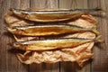 Fish saury smoked on wooden background