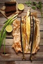 Fish saury smoked on wooden background