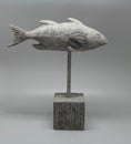 Fish sculpture. Hand made Fish sculpture. Engraved style. Sea and river fish. Bibelot home accessory. Royalty Free Stock Photo