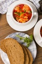Fish soup in a bowl with home baked bread Royalty Free Stock Photo