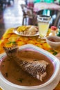 Fish soup in the central market in Leticia Amazonas Colombia