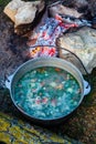 Fish soup prepared over an open fire. Royalty Free Stock Photo