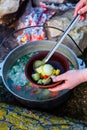 Fish soup prepared over an open fire. Royalty Free Stock Photo