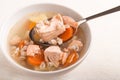 Fish soup with salmon and orge perlÃÂ© in spoon