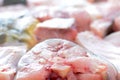 Fish stakes on plate ready to be covered in bread crumbs and baked