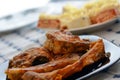 Fish stakes on plate served on home table