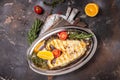 fish steak grill Atlantic wolffish, seawolf or catfish steak, on a dark background, top view