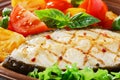 Fish steak grilled vegetables Royalty Free Stock Photo