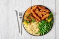 Fish sticks with couscous and green beans Royalty Free Stock Photo