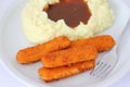 Fish sticks with matched potatoes Royalty Free Stock Photo
