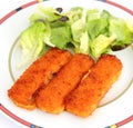 Fish sticks with salad Royalty Free Stock Photo