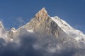 Fish Tail Peak Machapuchare surrounded by rising clouds, Himalayas Royalty Free Stock Photo