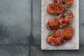 Fish Tapas on Crusty Bread, bread and cured salmon Royalty Free Stock Photo