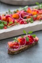 Fish Tapas on Crusty Bread, bread and cured salmon Royalty Free Stock Photo