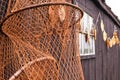 Fish traps and fishing nets with dried fish in the background in Enkhuizen, Nederland Royalty Free Stock Photo