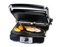 fish and vegetables on electric grill Royalty Free Stock Photo