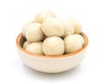 Fishballs in ceramic bowl on white background.