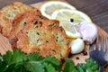 Fishcakes on wooden board