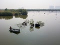 Fisheman relax on boat.