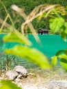 Fisher boat house and wooden hut with pier in the shore of Walchensee lake Royalty Free Stock Photo