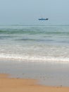 Fisher boat on a very calm day on the sea Royalty Free Stock Photo