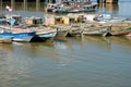 Fisher boats near fish market in Panama City with skyline background Royalty Free Stock Photo