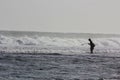 Fisher man in beach wave action bantul yogyakarta - indonesia