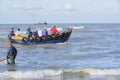 Fisher man working on boat