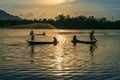 Fisher men fishing on a fishing boat in river in Mekong Delta on floating water season at sunset Royalty Free Stock Photo
