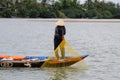 Fisher pulling up his net with his catch Royalty Free Stock Photo