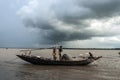 The fisherman`s life on boat in the bank of river. Royalty Free Stock Photo